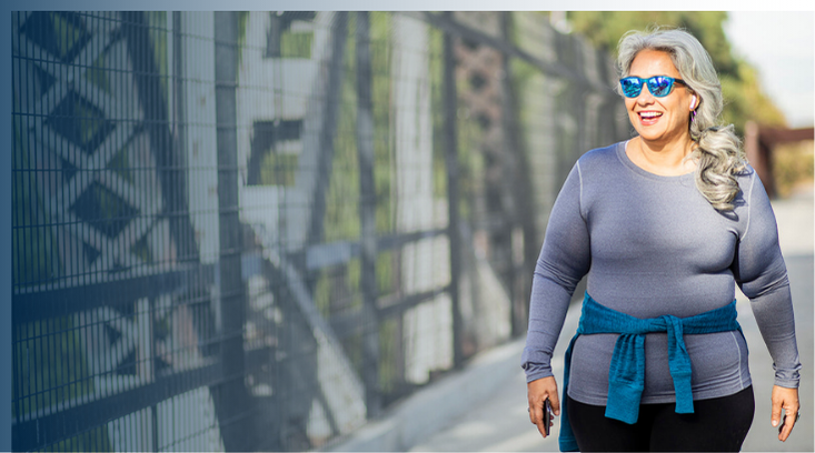 Woman walking on a bridge